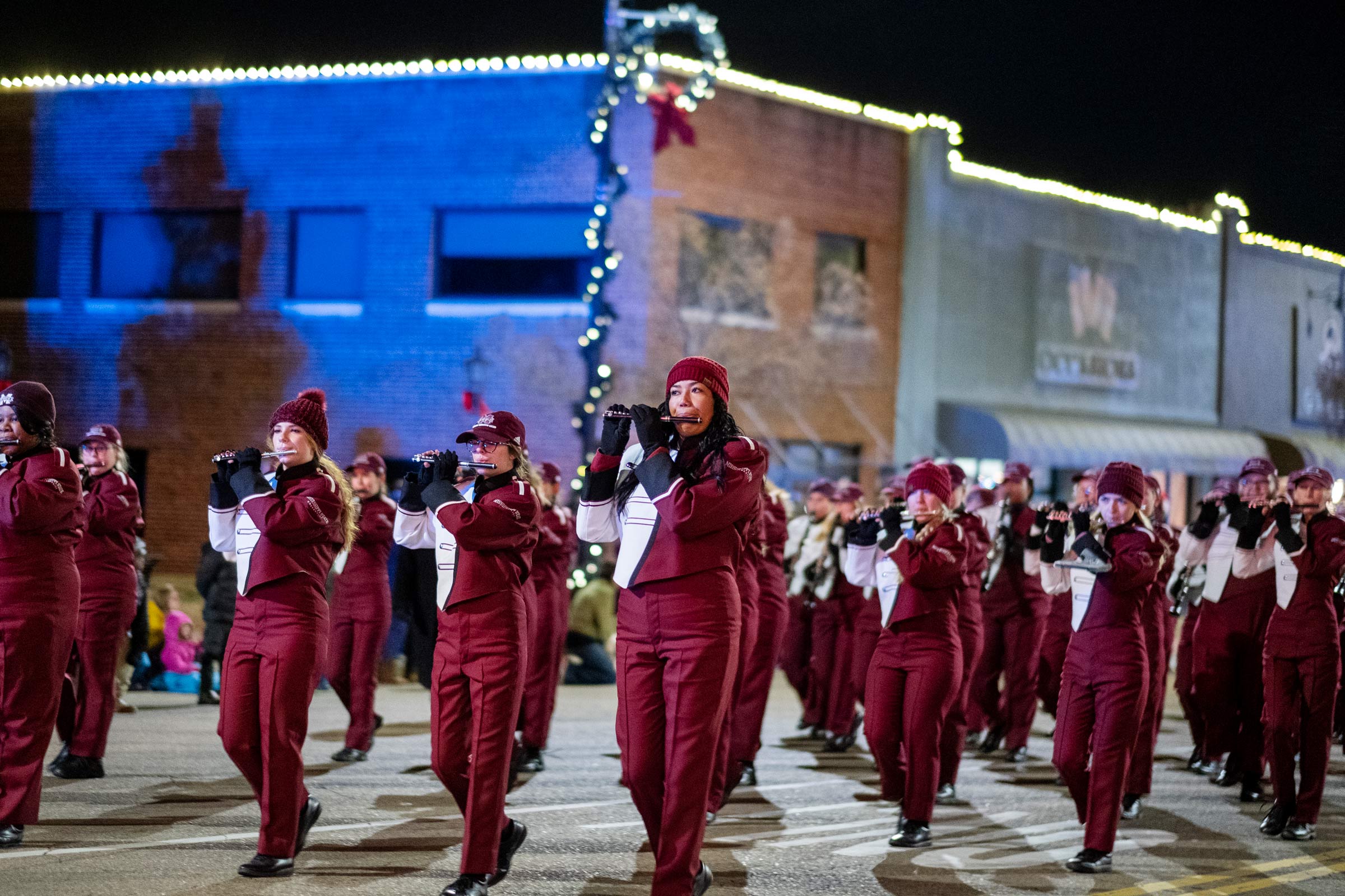 MSU&#039;s Famous Maroon Marching Band marches through downtown Starkville as part of the 2019 Christmas Parade.
