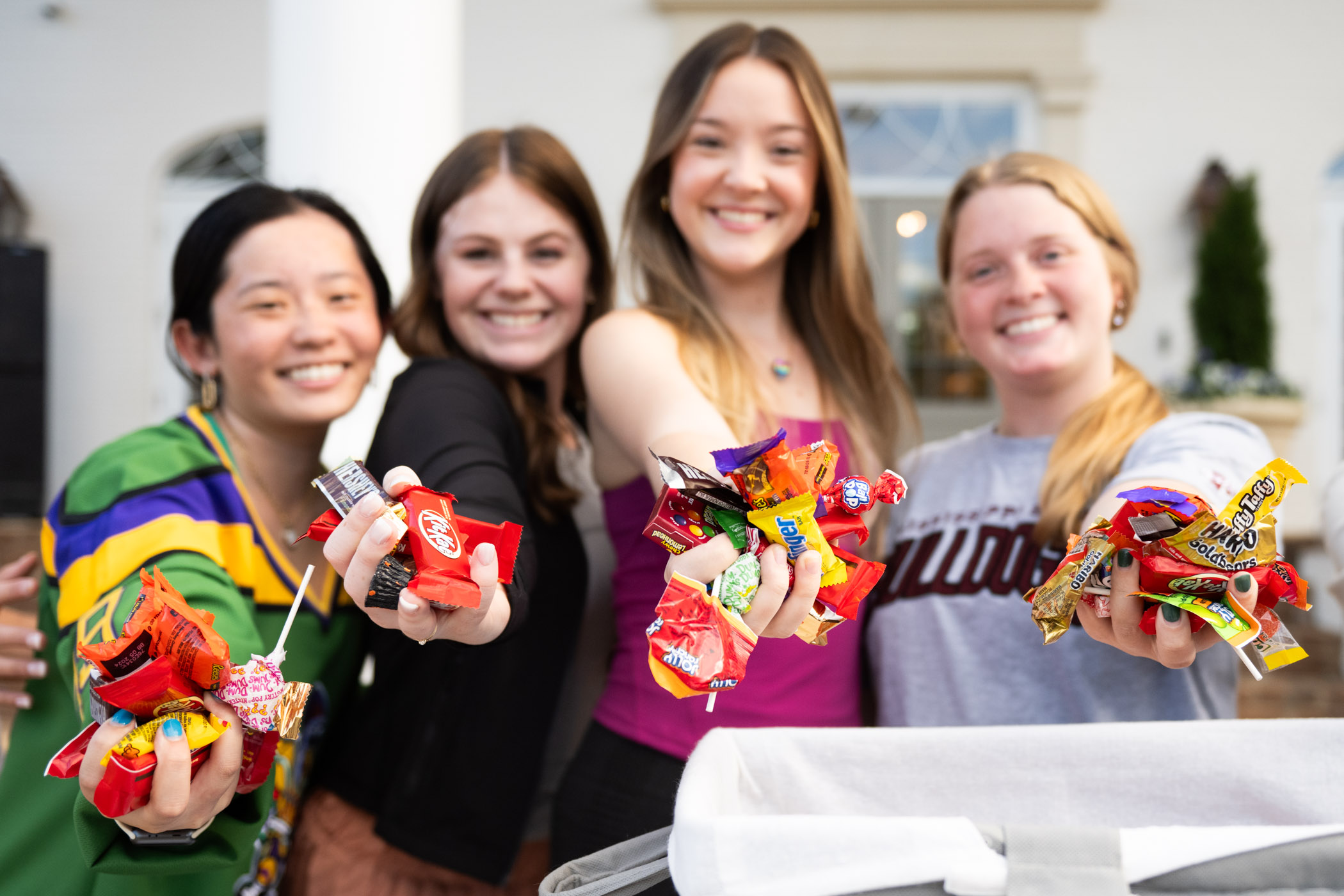 Sisters of Delta Gamma sorority hand out candy to excited participants at MSU Sorority and Fraternity Life&#039;s annual event &quot;Trick or Treat on the Row.&quot; 