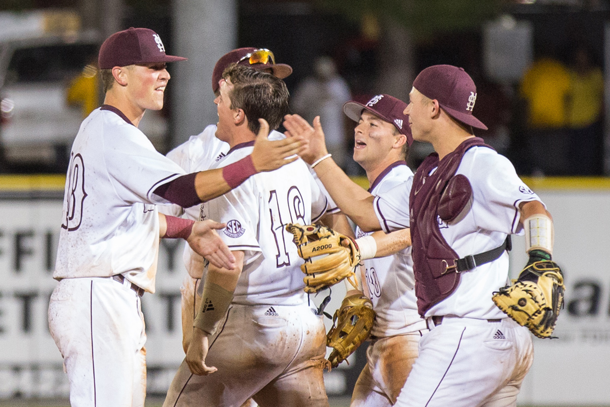 MSU Baseball players celebrate the win over USM to advance to the Super Regionals.