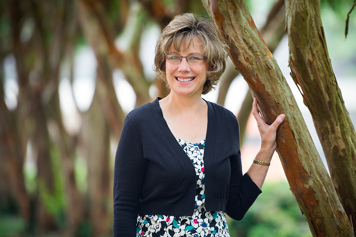 Dana Franz, pictured next to a tree on campus.