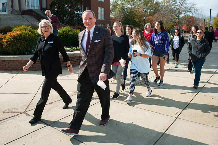 SU President Mark E. Keenum joins a &amp;quot;Celebrity Walk&amp;quot; around the Drill Field with MSU students and Director of Health Promotion and Wellness Joyce Yates
