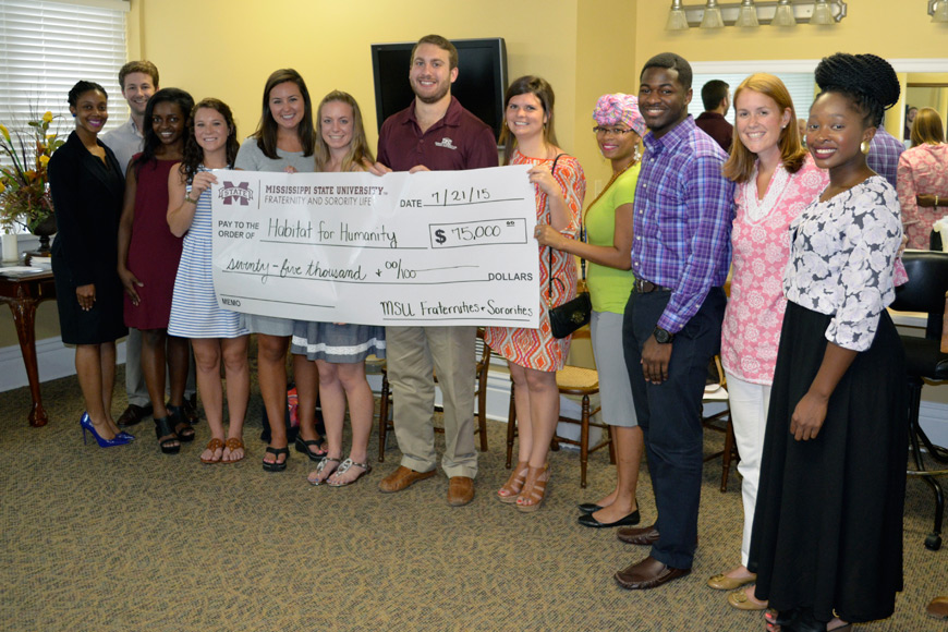 MSU’s Office of Fraternity and Sorority Life recently donated $75,000 for a new Starkville Area Habitat for Humanity home. Presenting a check to the committee recently were (l-r) Stevany Jackson; John Michael VanHorn, fraternity and sorority life assistan