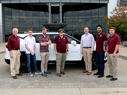 The MSU EcoCAR Mobility Challenge team is pictured with a 2019 Chevrolet Blazer during a recent visit to the General Motors Propulsion Center in Pontiac, Michigan. Competition sponsors U.S. Department of Energy, General Motors and Mathworks announced Friday [Oct. 26] that MSU is among 12 universities selected to compete in the prestigious advanced automotive engineering competition. (Submitted photo) 