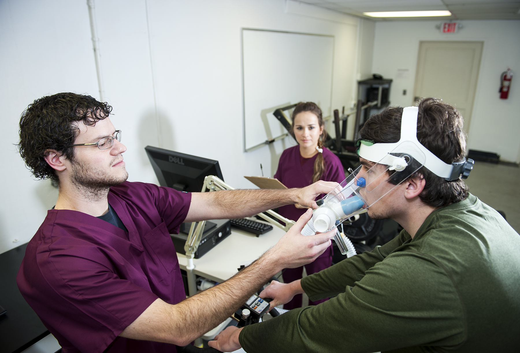 Mississippi State University's kinesiology department will begin offering doctoral degrees in the fall. Here, master's-level students collect data to assess the oxygen cost of stationary cycling. 