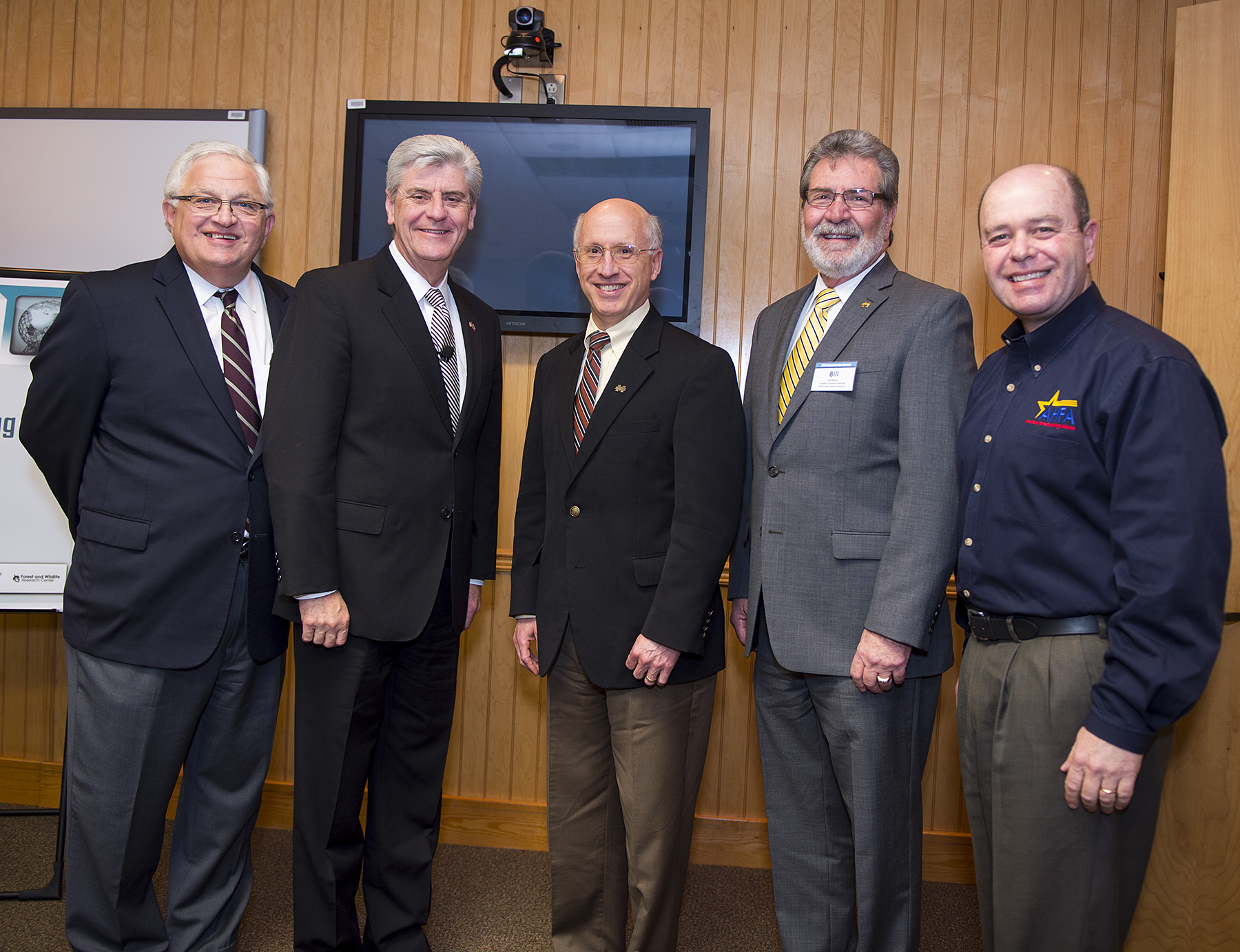 Mississippi State University hosted the 2015 Manufacturing Summit, "Focus on the Future," on Wednesday [March 18]. From left are former MSU President Malcolm A. Portera, Gov. Phil Bryant, MSU Vice President for Research and Economic Development David Shaw, Franklin Furniture Institute Director Bill Martin and American Home Furnishings Alliance Vice President of Regulatory Affairs Bill Perdue.