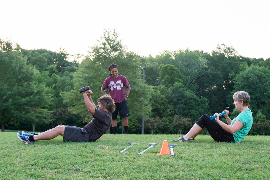 Participants workout during a morning “Boot Camp” session at MSU’s Sanderson Center. (Photo by Beth Wynn)