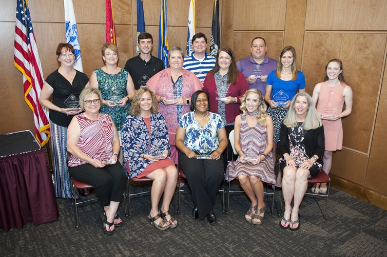 The newest Departmental Administrator Working Group graduates are (seated, l-r) Donna Edwards, Sarah Brown, Koretta Reed, Kristen Nichols and Jessie Schmidt; and (standing, l-r) Kay Travis, Christy Green, Chris Kolb, LeeAnn Funderburg, Bailey Anderson, Renee Brannon, Webb Jennings, Caty McCluskey, Kim Rayborn. Not pictured: Ginger Cavinder, Tiffany Middleton and Ashley Patterson. (Photo by Russ Houston)