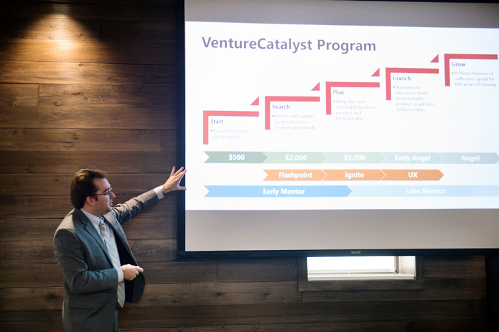 MSU Center for Entrepreneurship and Outreach Director Eric Hill outlines the center’s VentureCatalyst program during a presentation to university leaders on Tuesday [June 20]. (Photo by Megan Bean)