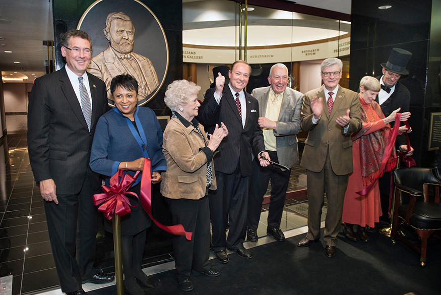 Officials celebrate the grand opening of Mississippi State’s $10 million addition to Mitchell Memorial Library, home of the Ulysses S. Grant Presidential Library and the prestigious Frank J. and Virginia Williams Collection of Lincolniana. Pictured, from left to right, are U.S. Rep Gregg Harper, Librarian of Congress Carla Hayden, MSU Dean of Libraries Frances Coleman, MSU President Mark E. Keenum, former Rhode Island Supreme Court Justice Frank J. Williams, Mississippi Gov. Phil Bryant, Virginia Williams and an actor portraying Abraham Lincoln. (Photo by Megan Bean)
