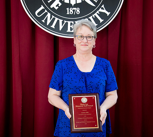Annice Hill holds the CFR/FWRC Doris Lee Memorial Staff Award