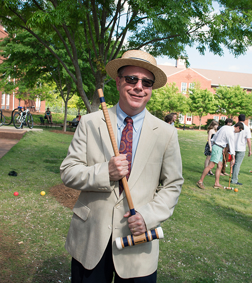 Chris Snyder, dean of MSU’s Shackouls Honors College, is pictured with Oxford study abroad program participants at a spring croquet social in the Griffis Hall courtyard. Snyder is among world-class honors faculty who enjoy sharing knowledge and providing mentorship to students throughout their MSU experience. (Photo by Megan Bean)