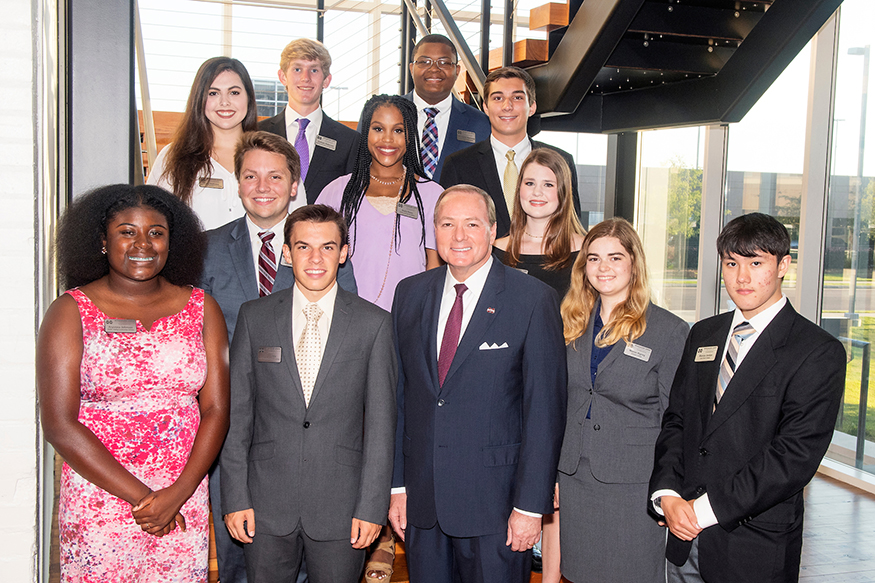 MSU President Mark E. Keenum (front row, center) visited with the university’s newest Presidential Scholars during a recent dinner at The Mill at MSU in Starkville. Pictured are (front row, l-r) Aryonna Johnson of Macon, Reese Dunne of Starkville, (Keenum), Maeve Rigney of Madison, Marcus Jordan of Texarkana, Texas; (middle row, l-r) Tyler Dickerson of Starkville, Kayla Powe of Meridian, Anne Elizabeth Harrington of Madison; (back row, l-r) Flora Dedeaux of Gulfport, Graham Roberson of Jackson, Christopher Robinson of Brookhaven and Ryan Jarratt of Vicksburg. (Photo by Beth Wynn)