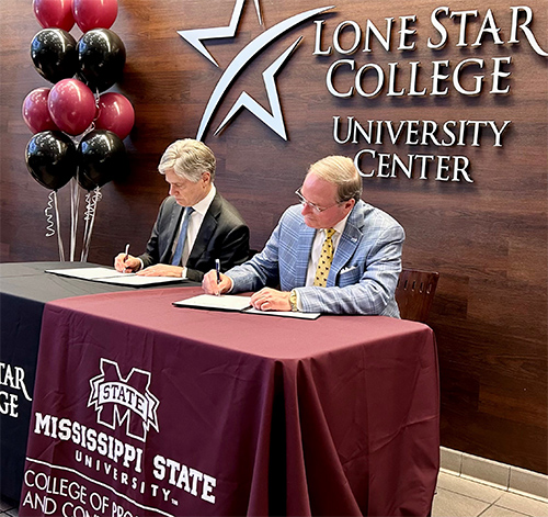 Lone Star College Vice Chancellor for Academic and Workforce Success Dwight Smith, left, and Mississippi State University President Mark E. Keenum signed an articulation agreement Tuesday [April 2] creating a partnership between the respective institutions and facilitating a seamless transfer process for students. 