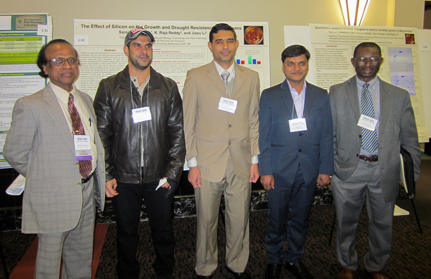 Three Mississippi State doctoral students were recognized for their research efforts during the Mississippi Academy of Sciences’ recent graduate student poster competition. Congratulating the students are MAS Division of Agriculture and Plant Sciences chair Girish Panicker, far left, and vice chair Victor Njiti, far right. The honorees include, from left to right, Ahmed Chaloob Saddam, Firas A. Alsajri and Saroj K. Sah. (Photo submitted)