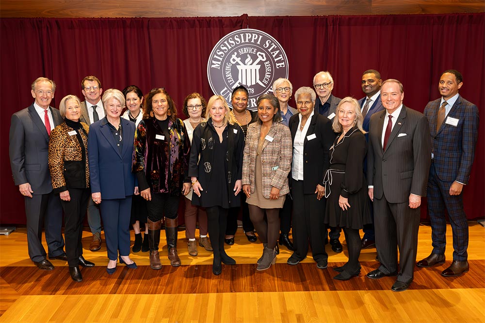Mississippi Museum of Art Board of Trustees members gathered with MMA Board Chair Denise Owens (front row, third from left) and MSU President Mark E. Keenum (front row, far right) recently to discuss an ongoing MMA-MSU partnership to promote the arts to students and citizens throughout the Magnolia State. 