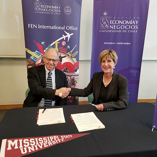 Manuel Agosin, dean of FEN from the University of Chile, and Sharon Oswald, dean of MSU’s College of Business, signed a memorandum of understanding that will facilitate MSU study abroad opportunities for MSU students to attend Chile’s oldest economics and business school. (Photo submitted)