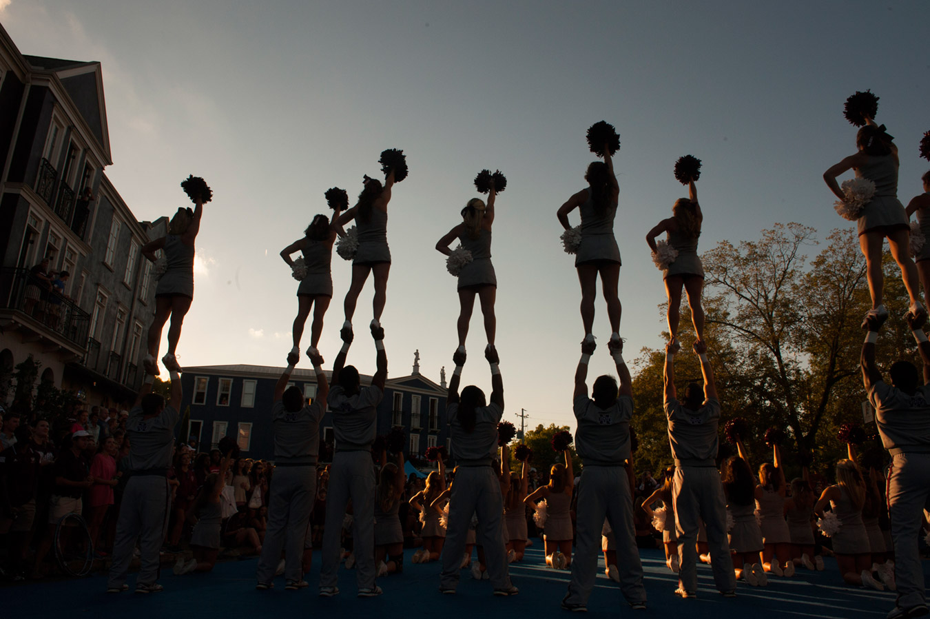 MSU cheerleaders perform during a pre-game pep rally in Starkville’s Cotton District. (Photo by Megan Bean)