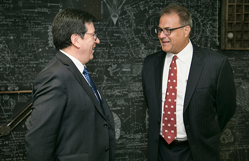 Christian Nicolai, left, Executive Director of Chile’s National Commission for Scientific and Technological Research, visits with Richard Nader, right, MSU associate vice president for international programs and executive director of the university’s International Institute. (Photo submitted)