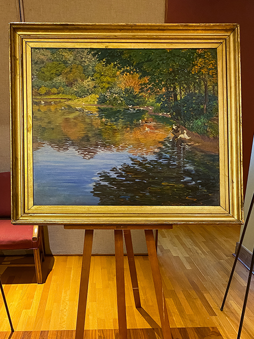 “Mill Pond, Moors Mill,” an oil painting by Holly Springs native Kate Freeman Clark, is pictured on an easel in MSU's John Grisham Room.