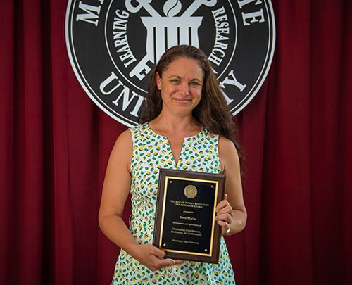 Dana Morin holds the CFR/FWRC Research Award