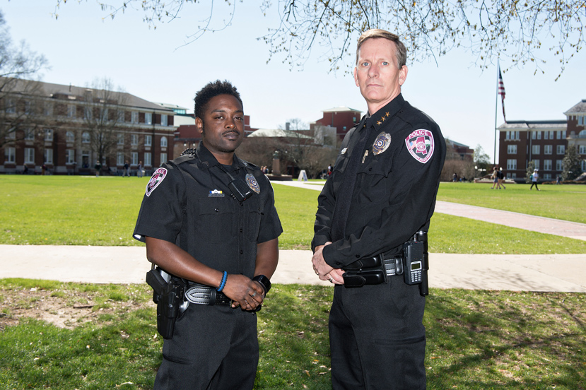 MSU Police Department Corporal Emmitt Johnson (left) and Police Chief Vance Rice wear the department’s new uniforms, which all officers will begin wearing next week. (Photo by Beth Wynn)