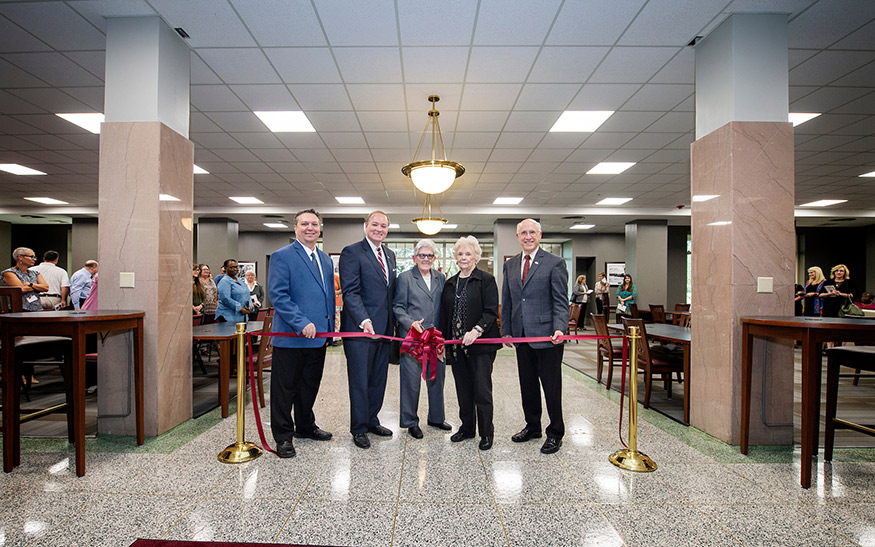 MSU alumna Janice I. Nicholson cutting a ribbon surrounded by Associate Dean of MSU Libraries Stephen Cunetto; MSU President Mark E. Keenum; Dean of Libraries Frances Coleman; and Provost and Executive Vice President David Shaw