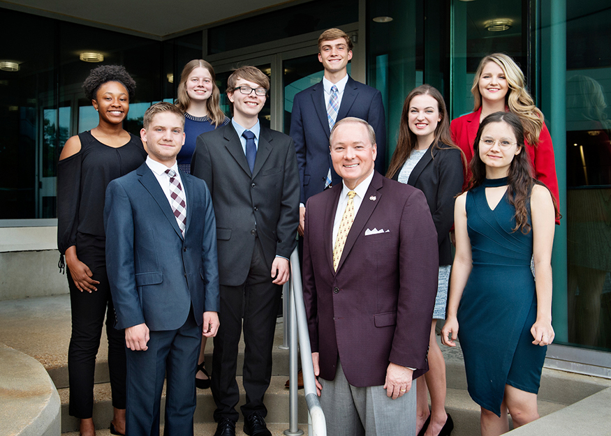 MSU’s newest Presidential Scholars take a group photo with President Mark E. Keenum at The Mill at MSU in Starkville.