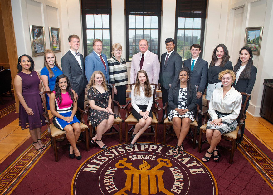 Pictured with MSU Provost and Executive Vice President Judy Bonner (left center) and MSU President Mark E. Keenum (right center), MSU’s newest Provost Scholars include (front row, l-r) Abigail Musser, Mary Margaret Mitchell, Anna Salzgeber, Sarah Grace Dulaney, Andi Durham; and (back row, l-r) Allyson Espy, Chappel Pettit, Tanner DeYoung, Jonathan Bailey, (Bonner), (Keenum), Isaac Johnson, Garrett Smith, Madeline Enlow and Abigail Grant; Not pictured is Jackson De Gruiter. (Photo by Megan Bean)