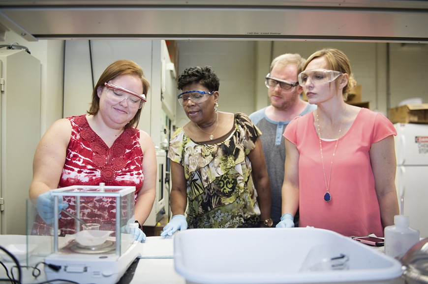 Area teachers get hands-on experience weighing alginate to make a gel during the two-week Research Experience for Teachers program put on by faculty in MSU’s Dave C. Swalm School of Chemical Engineering. Pictured, from left to right, are teachers Heather Yoder (Virgil Jones Jr. Elementary, Brooksville), Jettie Ware (Belle Shivers Middle School, Aberdeen), Michael Adam (Starkville High School) and Heather Henry (New Hope Middle School). (Photo by Megan Bean)