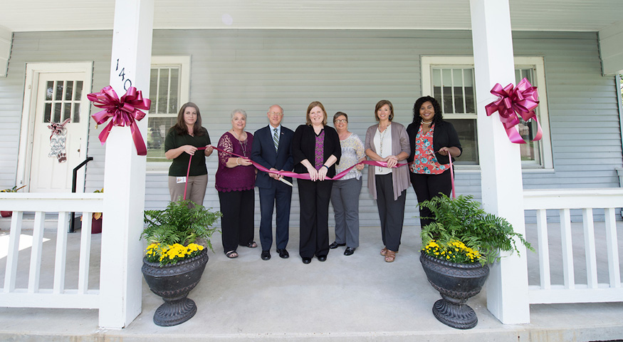 Mississippi State hosted a ceremonial ribbon cutting and open house Tuesday [Sept. 19] for the Office of Proposal Services, a new sub-unit of the university’s Office of Sponsored Projects. From left to right, ribbon-cutting participants included Katie Echols, director of research analysis and support, Office of Research and Economic Development; Dodie Maynard, Office of Sponsored Projects grants and contracts administrator; David Shaw, MSU vice president for research and economic development; Jennifer Easley, OSP director; Sandy Williamson, executive director of research fiscal affairs, Office of Research and Economic Development; Stephanie Hyche, OSP associate director; and Lauren Clark, OSP proposal development coordinator. (Photo by Megan Bean)