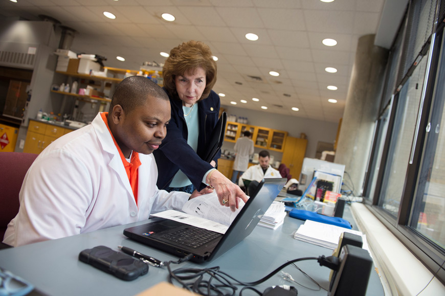 Jan Chambers, director of the Center for Environmental Health Sciences and professor in the College of Veterinary Medicine, works with Antonio Ward, an environmental toxicology doctoral student from West Point, in the Toxicology Lab located in MSU’s Wise Center. According to Chambers, good working relationships between students and professors are vital to the success of research projects in every field. She said mutual respect and honesty are important components of these relationships. (Photo by Megan Bean)