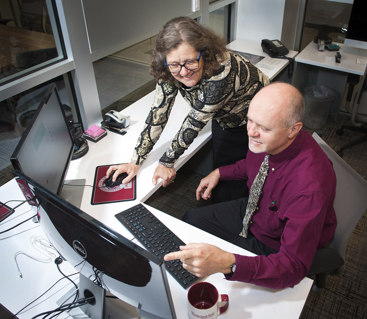 Karen Renaud (left), a computer scientist from the University of Glasgow in Scotland, is working with MSU Professor of Information Systems Merrill Warkentin through the Fulbright Cyber Security Awards program. (Photo by Russ Houston)