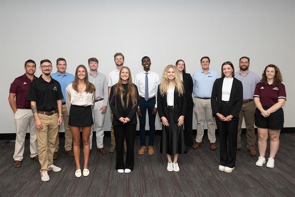 The first-place winners for their “AMP” project are Team 2 members, pictured with sponsors