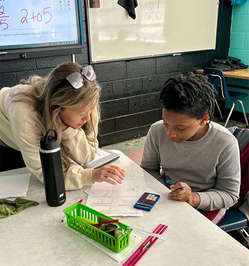 Ashlie Hollis, MSU elementary education alumna, instructs a student in her Choctaw County School District class.