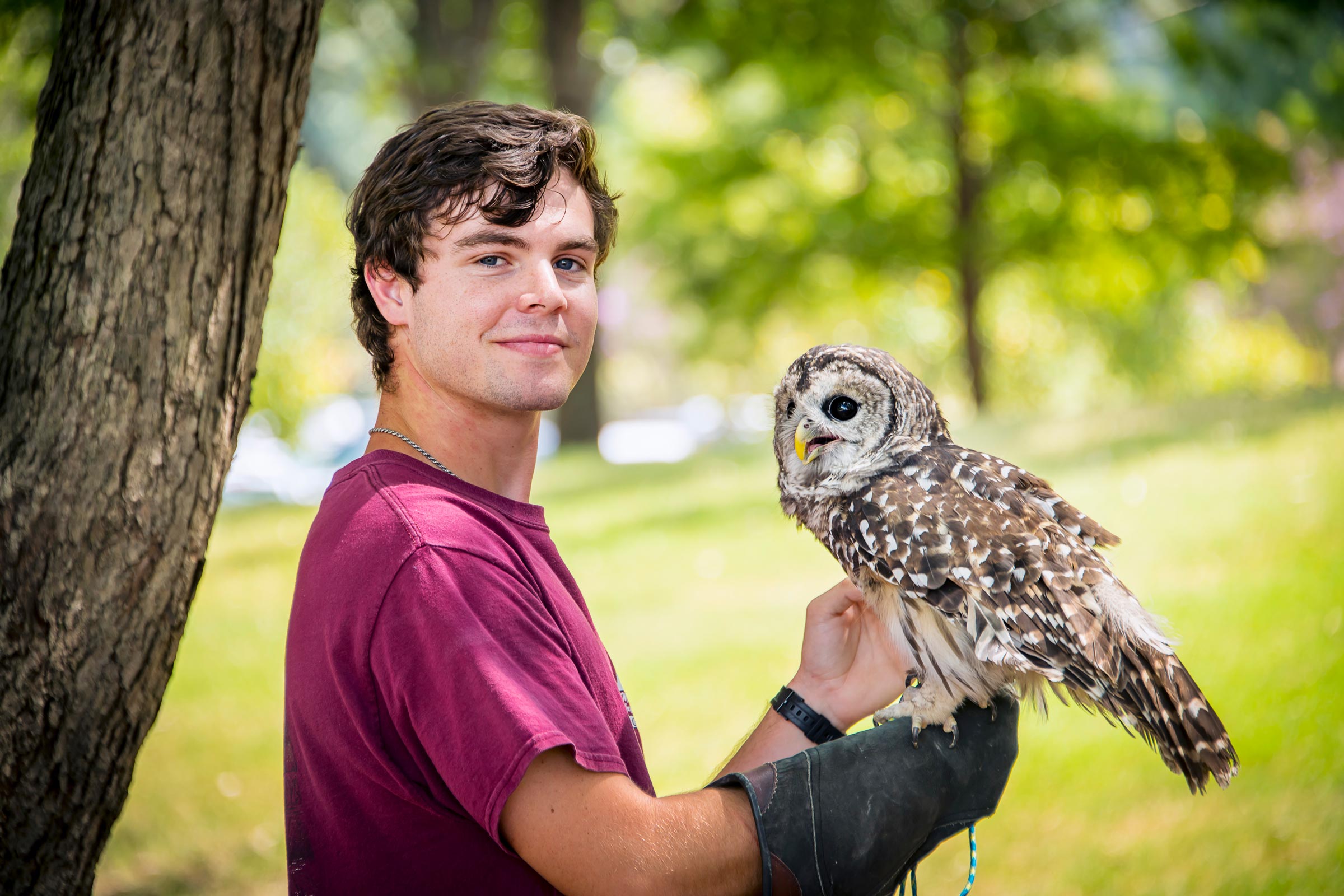 Carson Kitaif, pictured holding an owl.