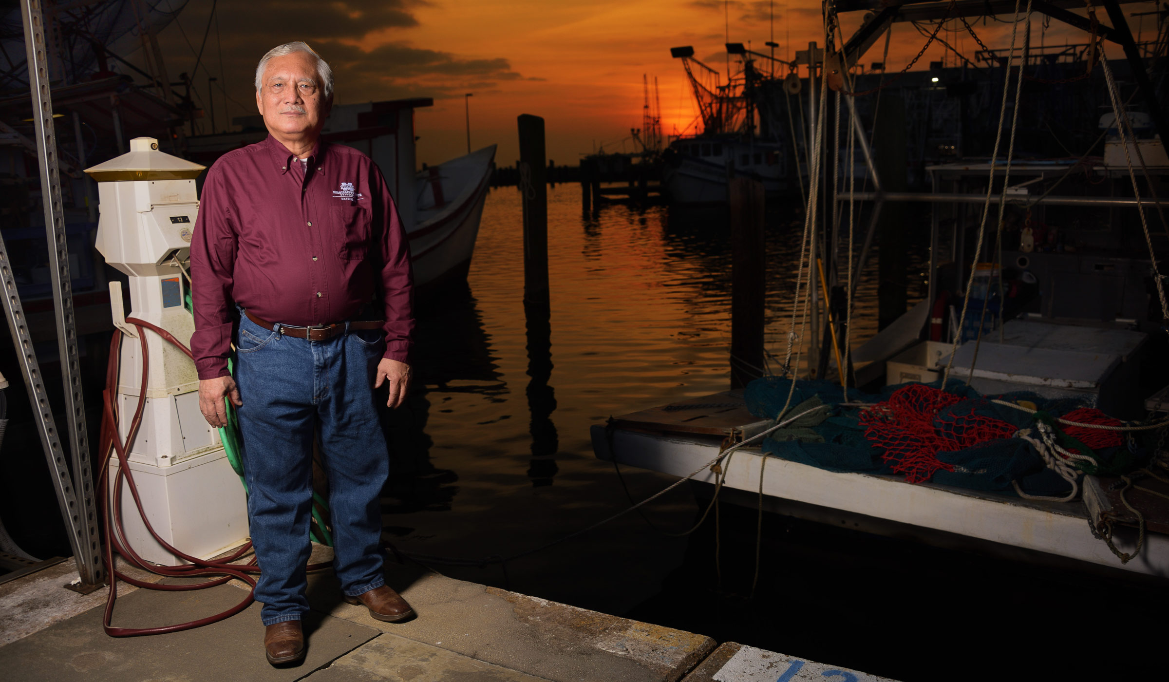 Ben Posadas, pictured on a Gulf Coast pier at sunset.