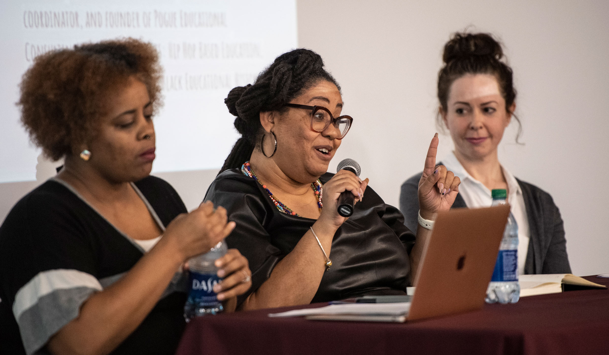 guest panelist Tiffany Pogue, assistant professor of teacher education and program coordinator of foundations of education and graduate programs answers a panel question.