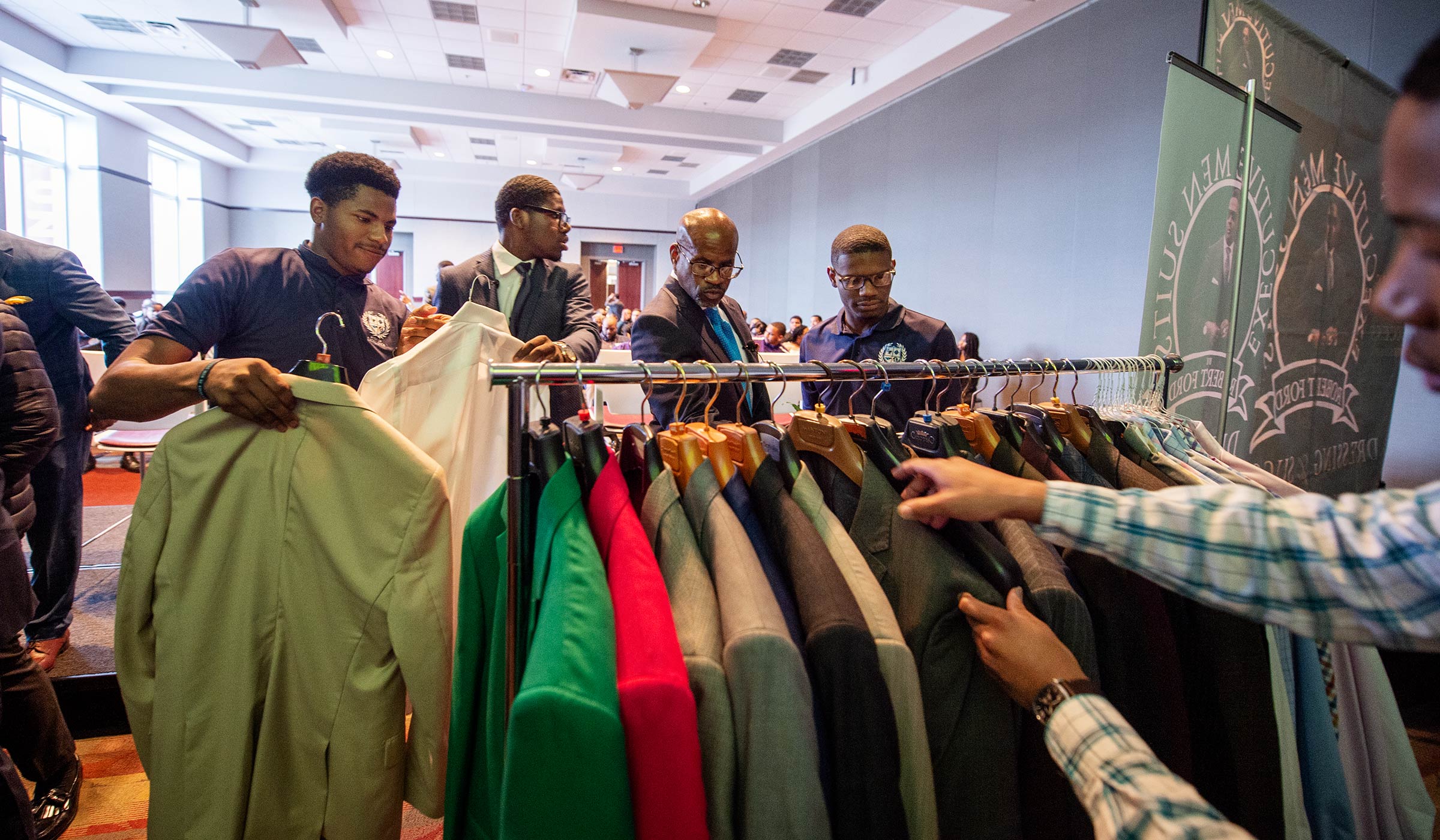 As part of the &quot;Dress for Success&quot; segment, MSU students pick through a rack of suits to find interview-appropriate attire.