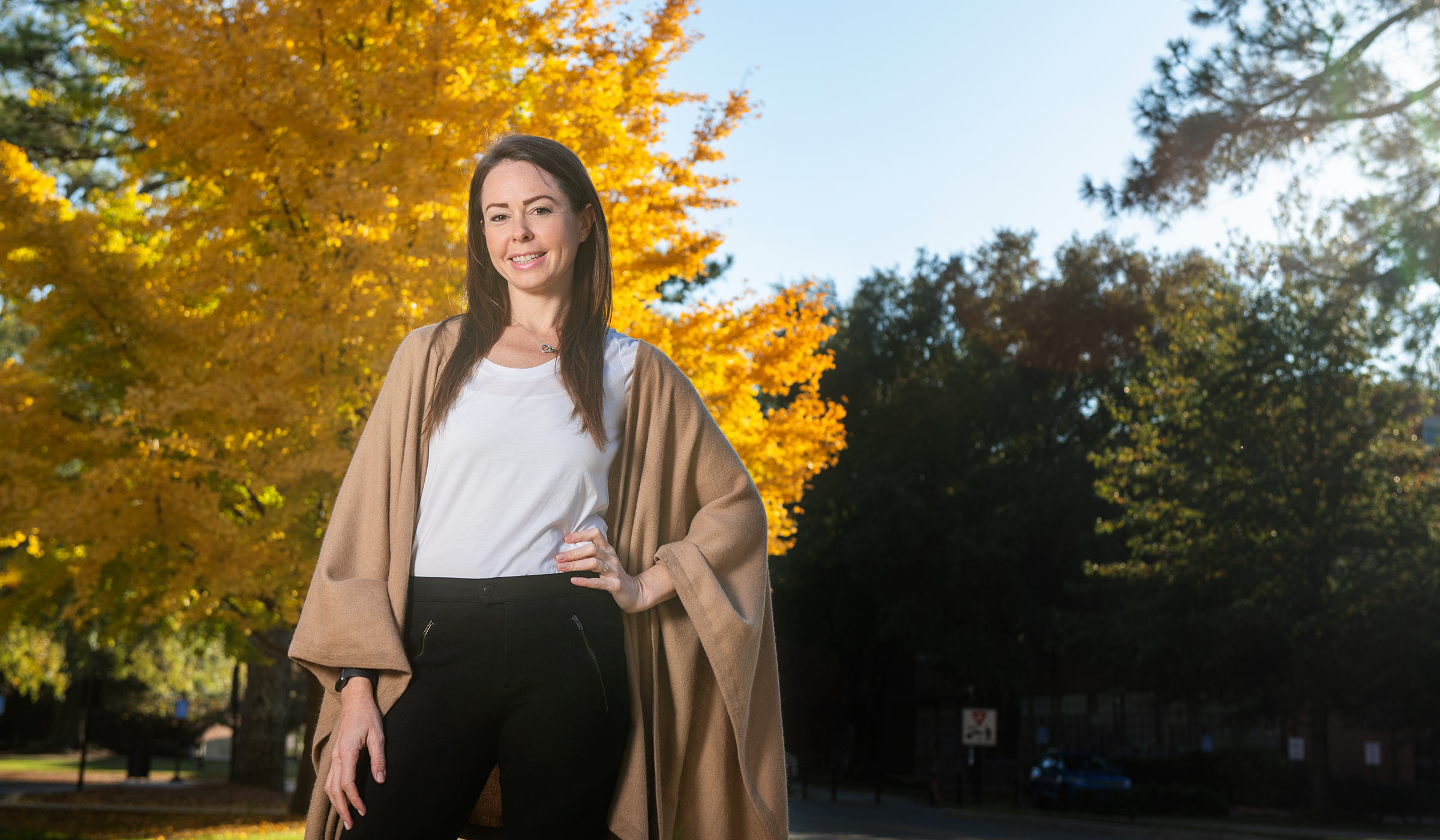 Maggie Hagerman, pictured in front of colorful fall leaves on the MSU campus.