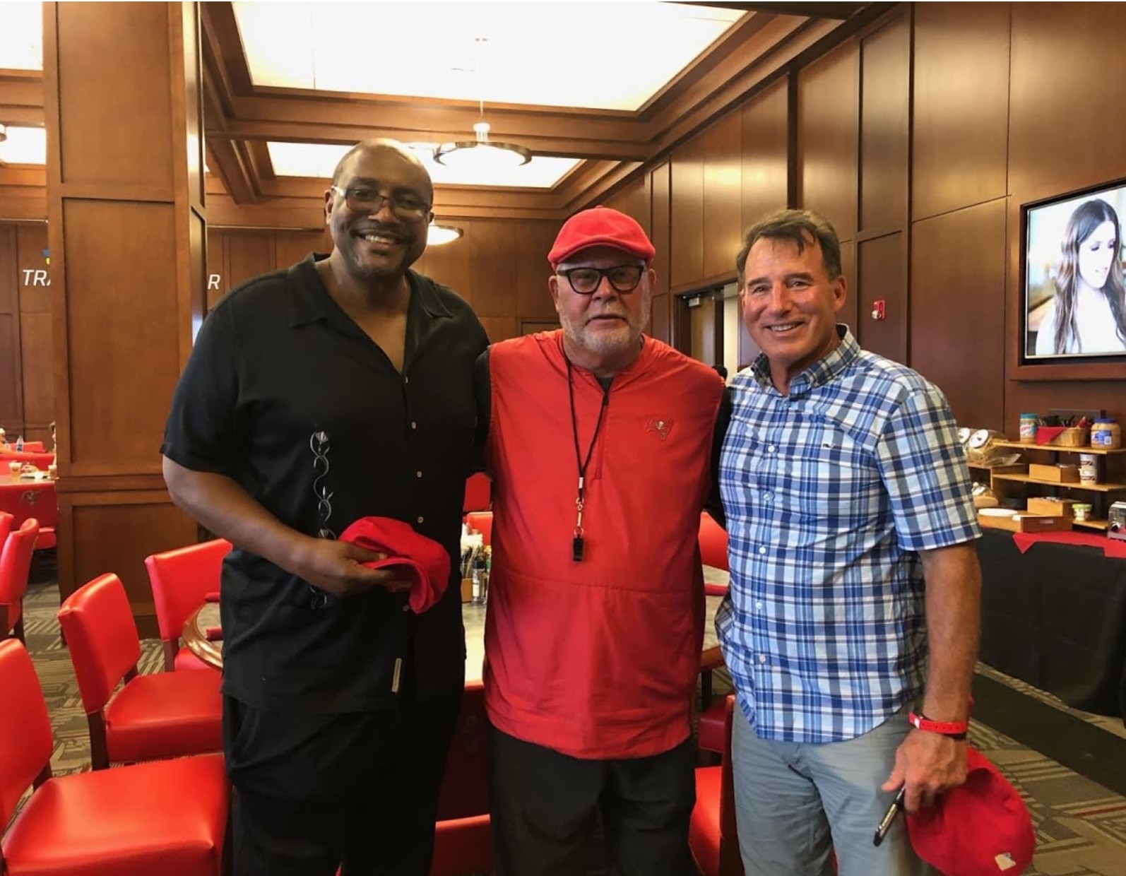 Group photo of Tyrone Keys, Bruce Arians and Mike McEnany