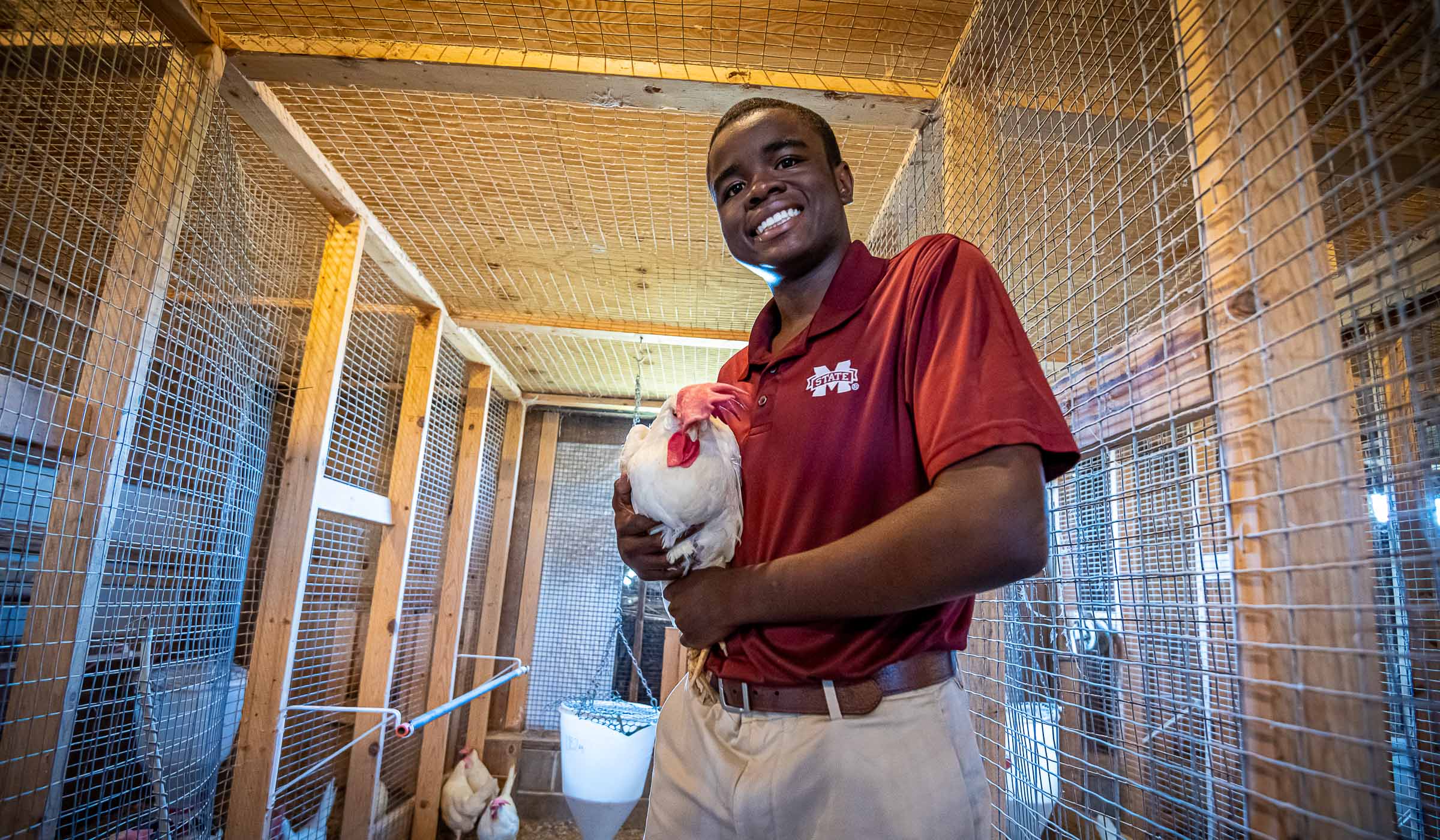 Rodney Self, pictured holding a chicken. 