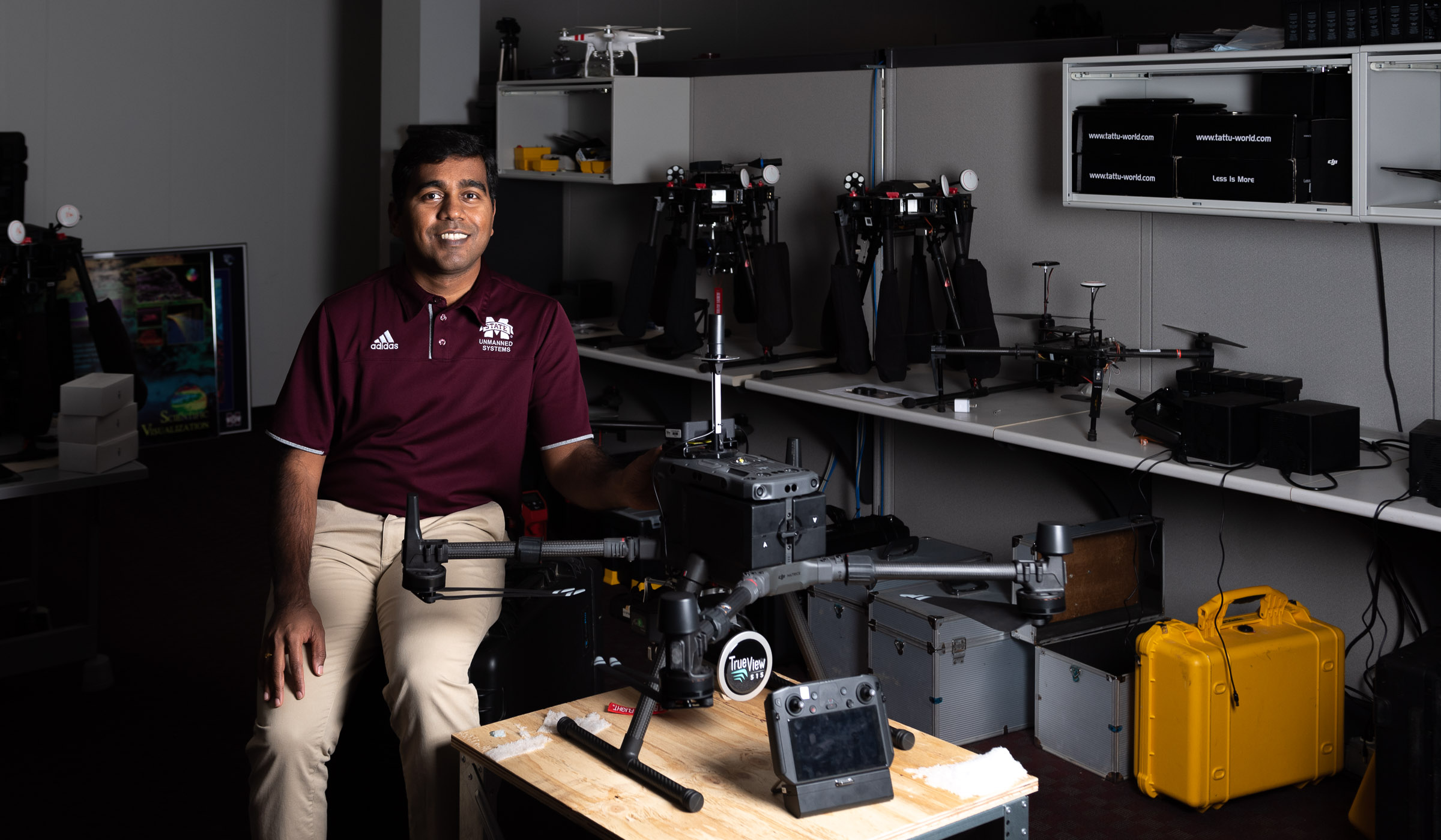 Sathish Samiappan, pictured next to a UAS and related equipment.