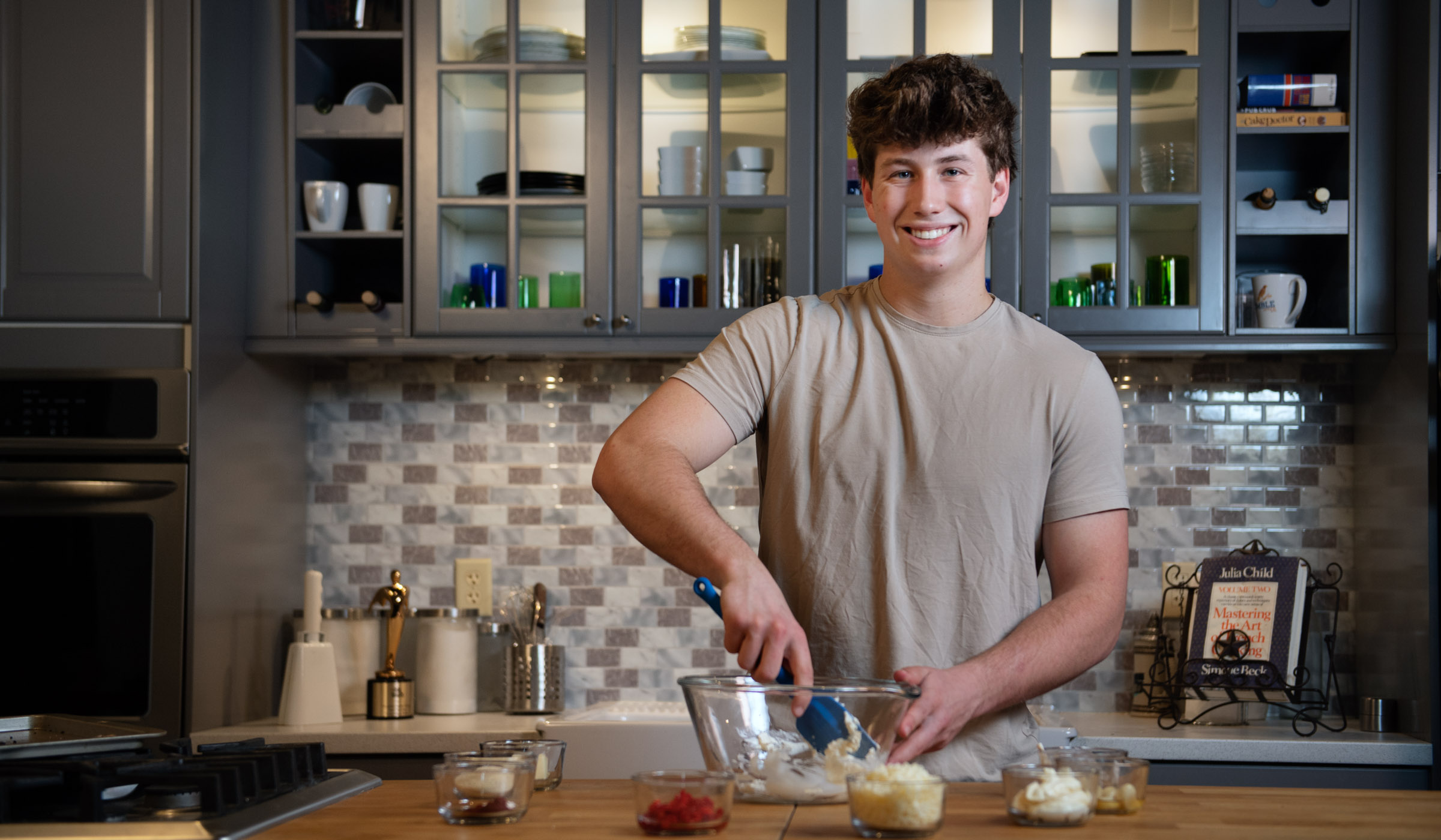 Mark Coblentz, pictured mixing together ingredients in a kitchen