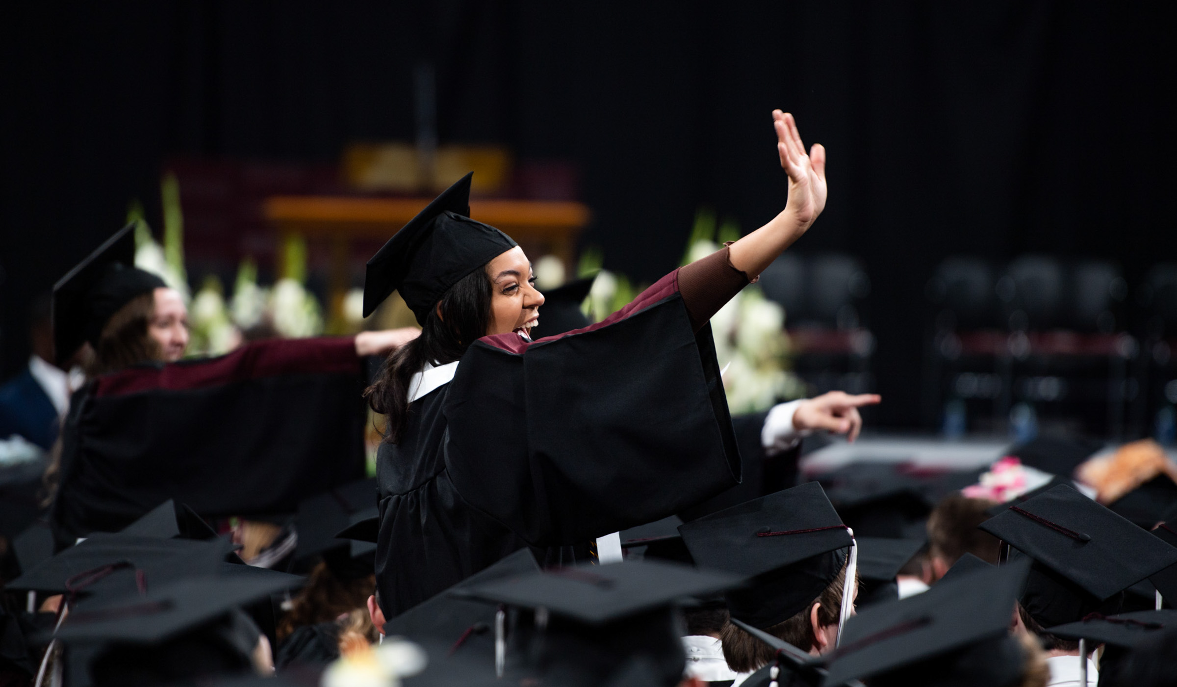 Spring graduation in Humphrey Coliseum first commencement ceremony for College of Arts and Sciences, College of Architecture, Art, &amp; Design