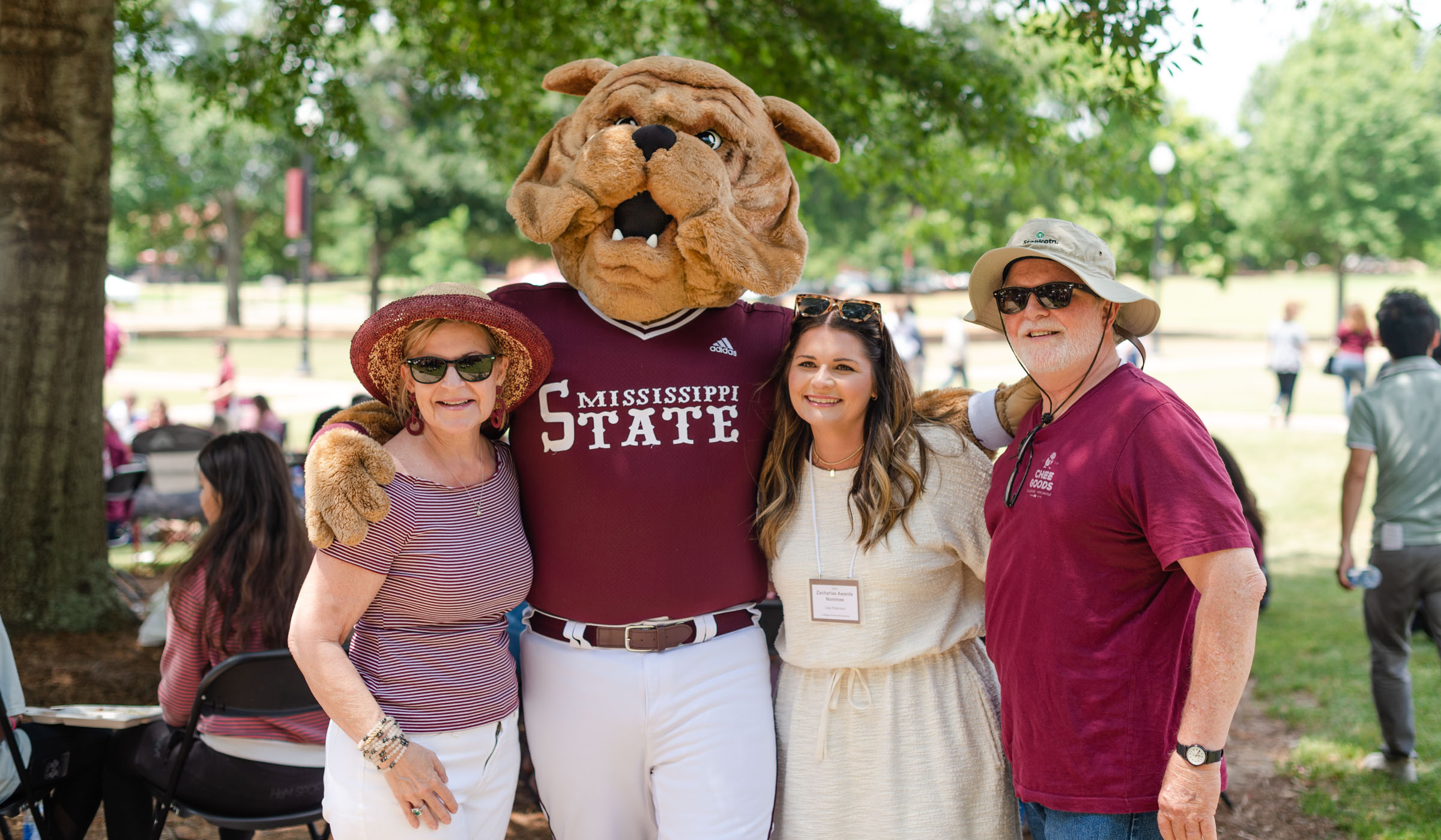 Staff posed with Bully during Staff Appreciation Day