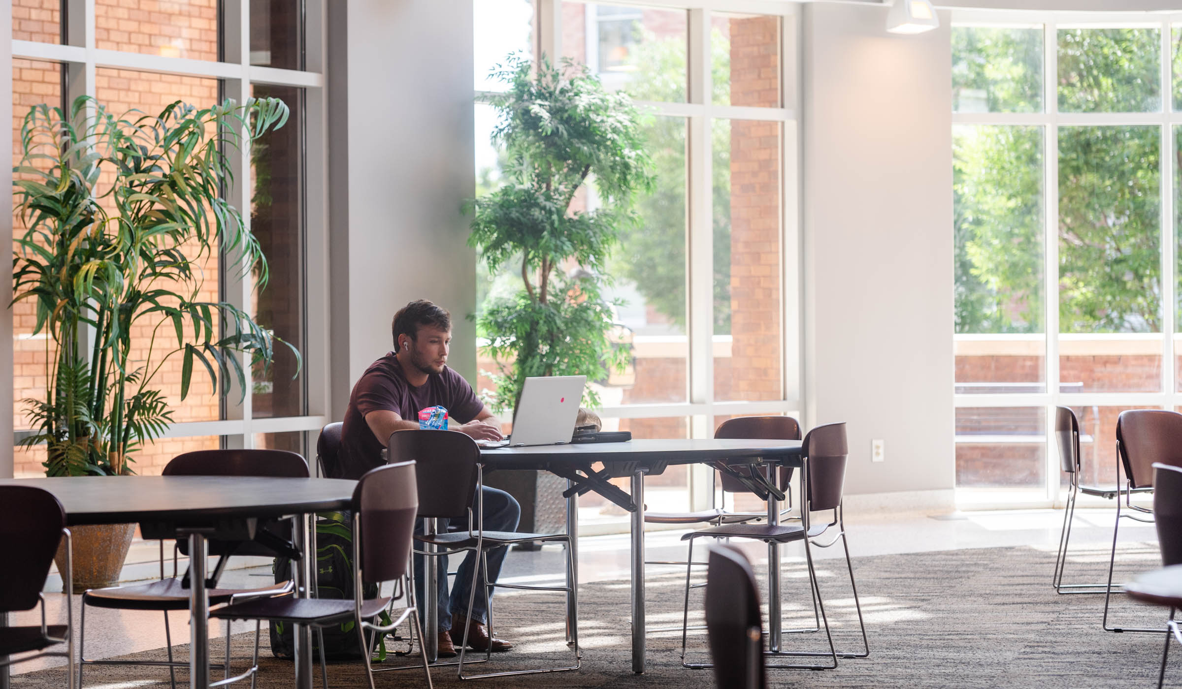 Student studying in McCool hall during Summer session