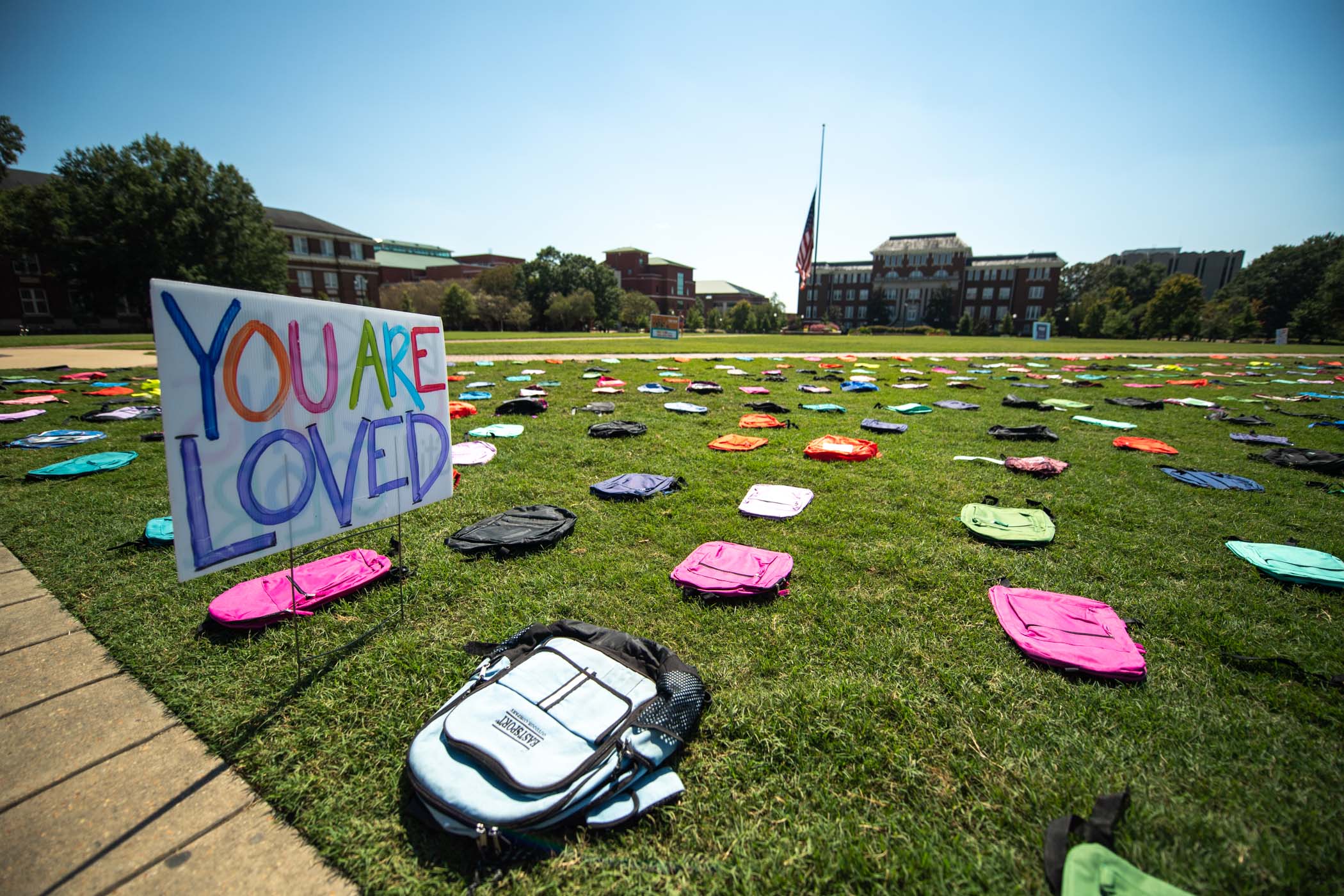 MSU&#039;s Department of Health Promotion and Wellness displays 1,000 empty backpacks across the Drill Field, representing the estimated number of college students who will lose their life by suicide to raise awareness and spread encouragement during National Suicide Prevention Month.