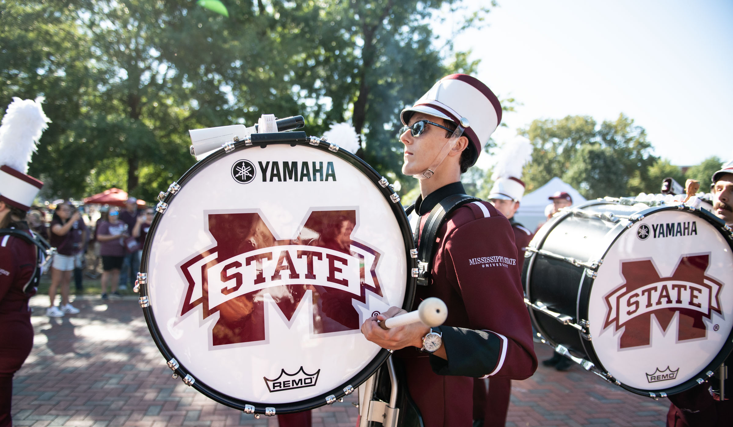 Alex Swan, pictured playing a bass drum before an MSU football game