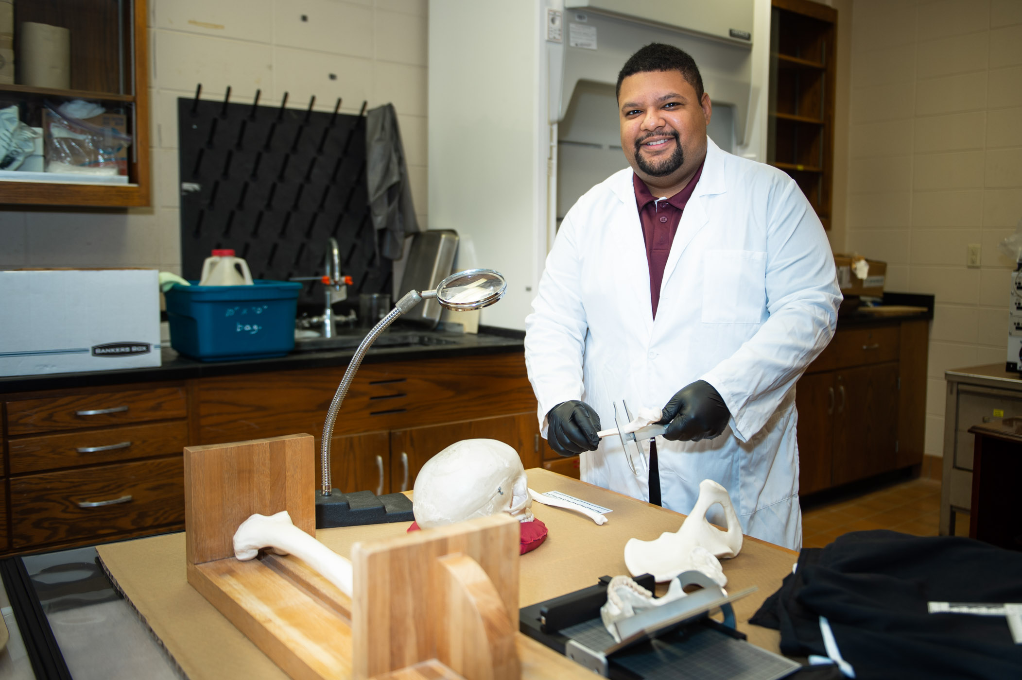 Jesse Goliath, pictured in a lab at MSU's Department of Anthropology.