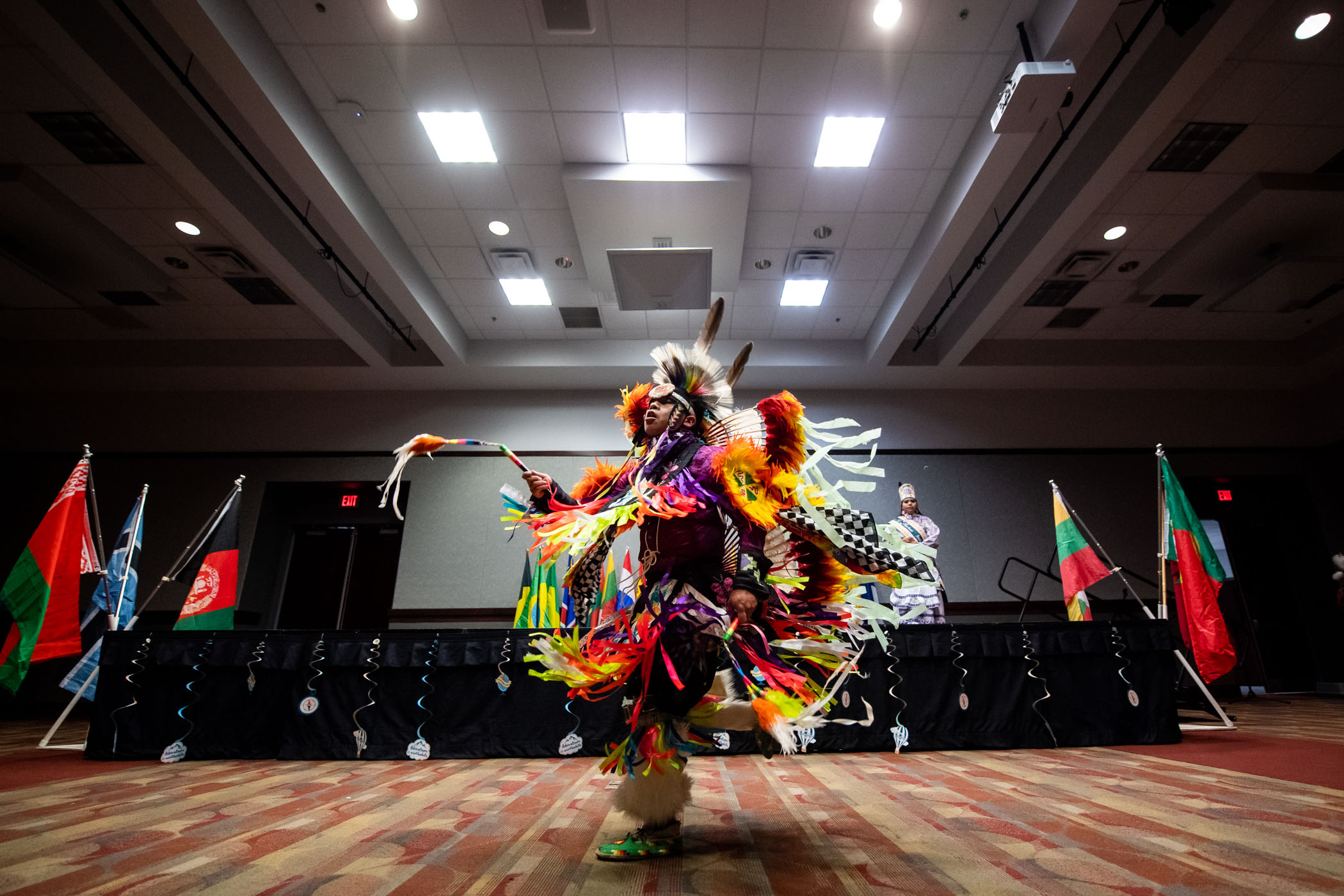 A member of MSU&#039;s Indigenous Student Alliance dances in time to a traditional tribal dance.